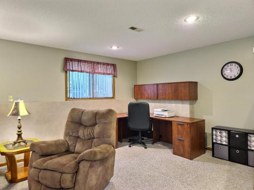 Family room has plenty of space for your home office