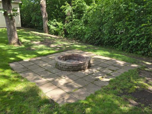 Picture the family seated around this firepit making smores!