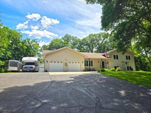 Set on nearly an acre, this private setting is awaiting its next family.