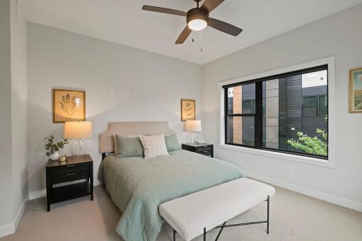 Sun Drenched Primary Suite Inlcludes Closet Organization System & Ensuite Bath!