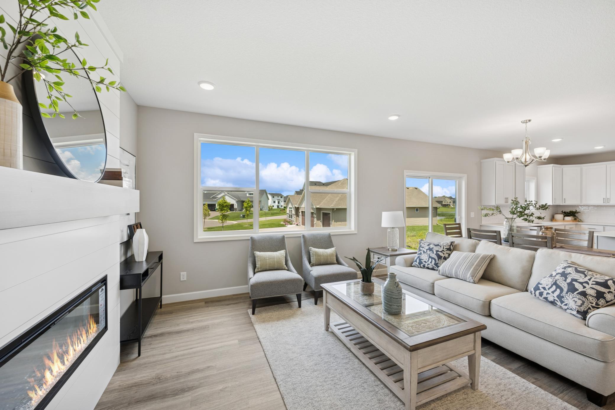 Living Room - photo is of a previous inventory home. Inquire for more details and options.