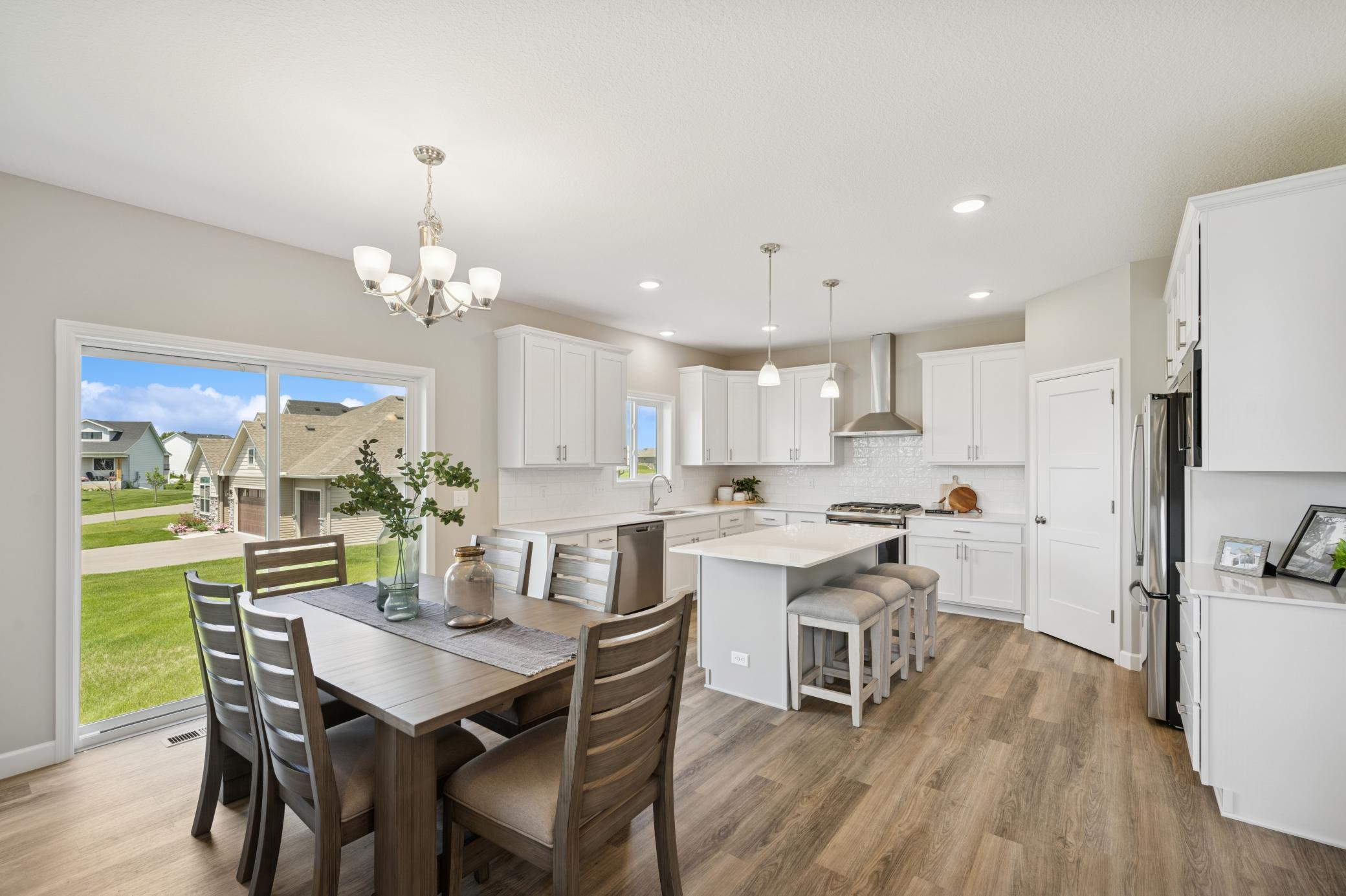 Dining Area - photo is of a previous inventory home. Inquire for more details and options.
