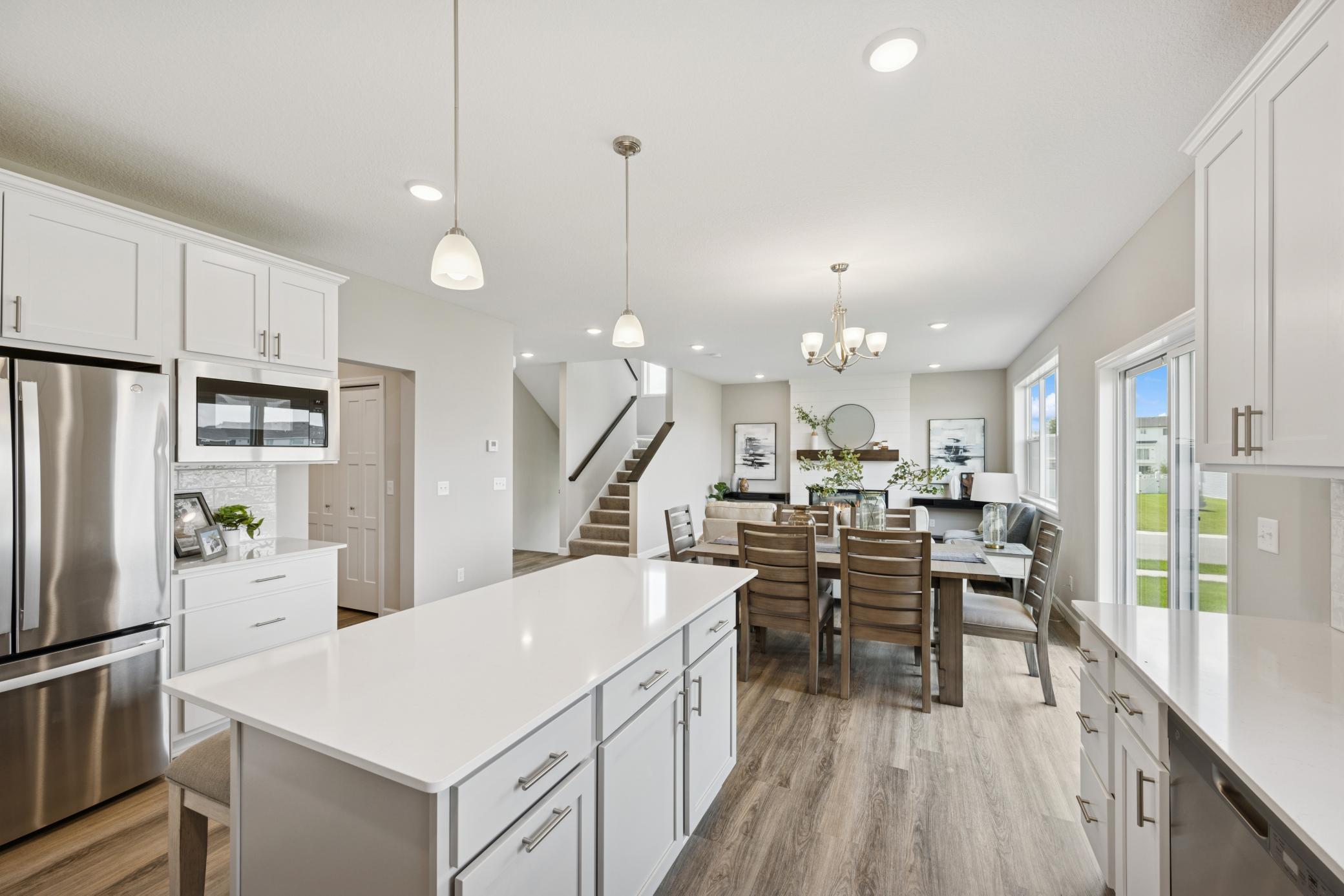 Kitchen - photo is of a previous inventory home. Inquire for more details and options.