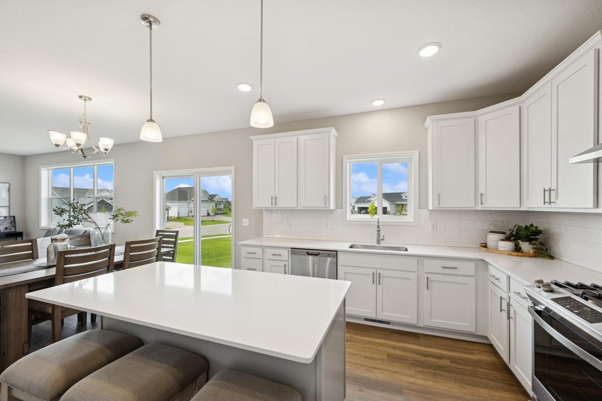 Kitchen - photo is of a previous inventory home. Inquire for more details and options.