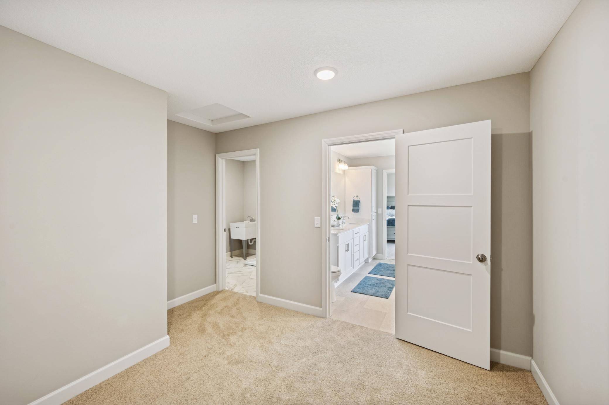 Upstairs Laundry - photo is of a previous inventory home. Inquire for more details and options.