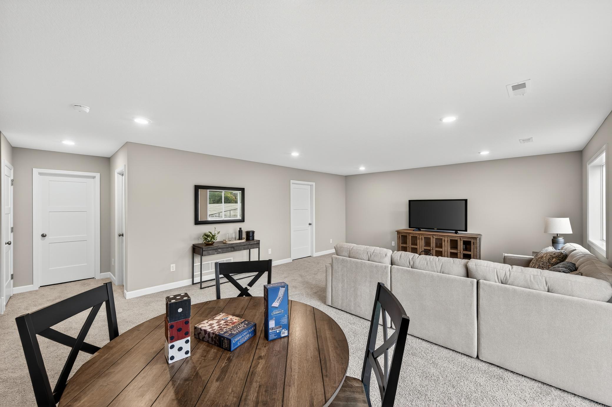 Finished Lower Level - photo is of a previous inventory home. Inquire for more details and options.