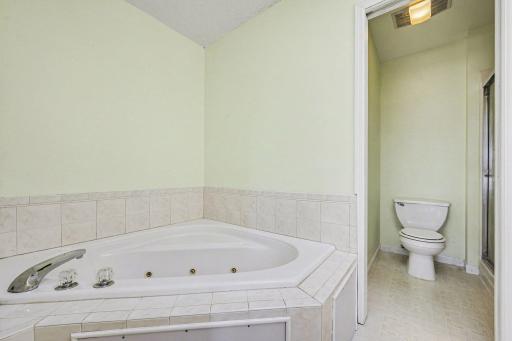 Spa-like master bath with soaking jetted tub and separate shower. This is what sellers will miss most