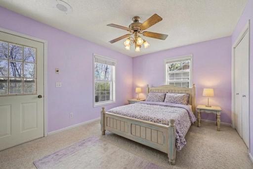 Generous primary bedroom with en-suite bathroom access (virtually staged to show potential layout)