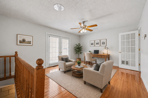 Currently set up as home office, originally designed as dining room. Easy to convert back or keep flexible (virtually staged to show potential layout)