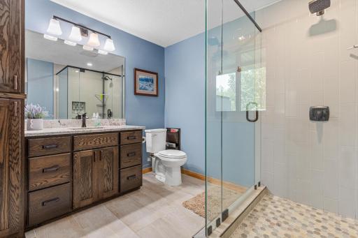 High end finishes with a walk in shower.