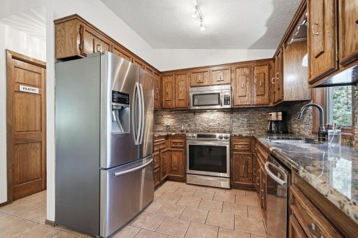 Kitchen has tons of counter and cabinet space along with stainless appliances!