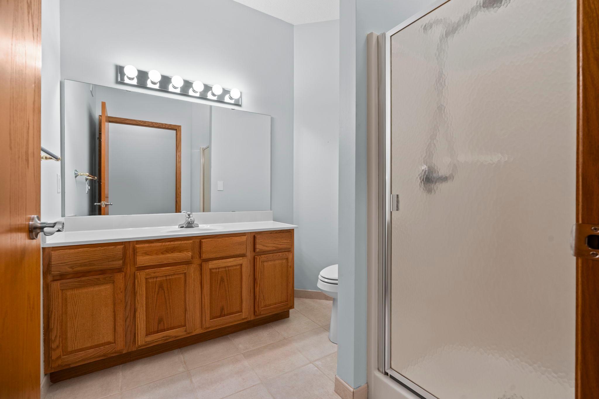 Additional 3/4 bathroom on the main level setup for guests.