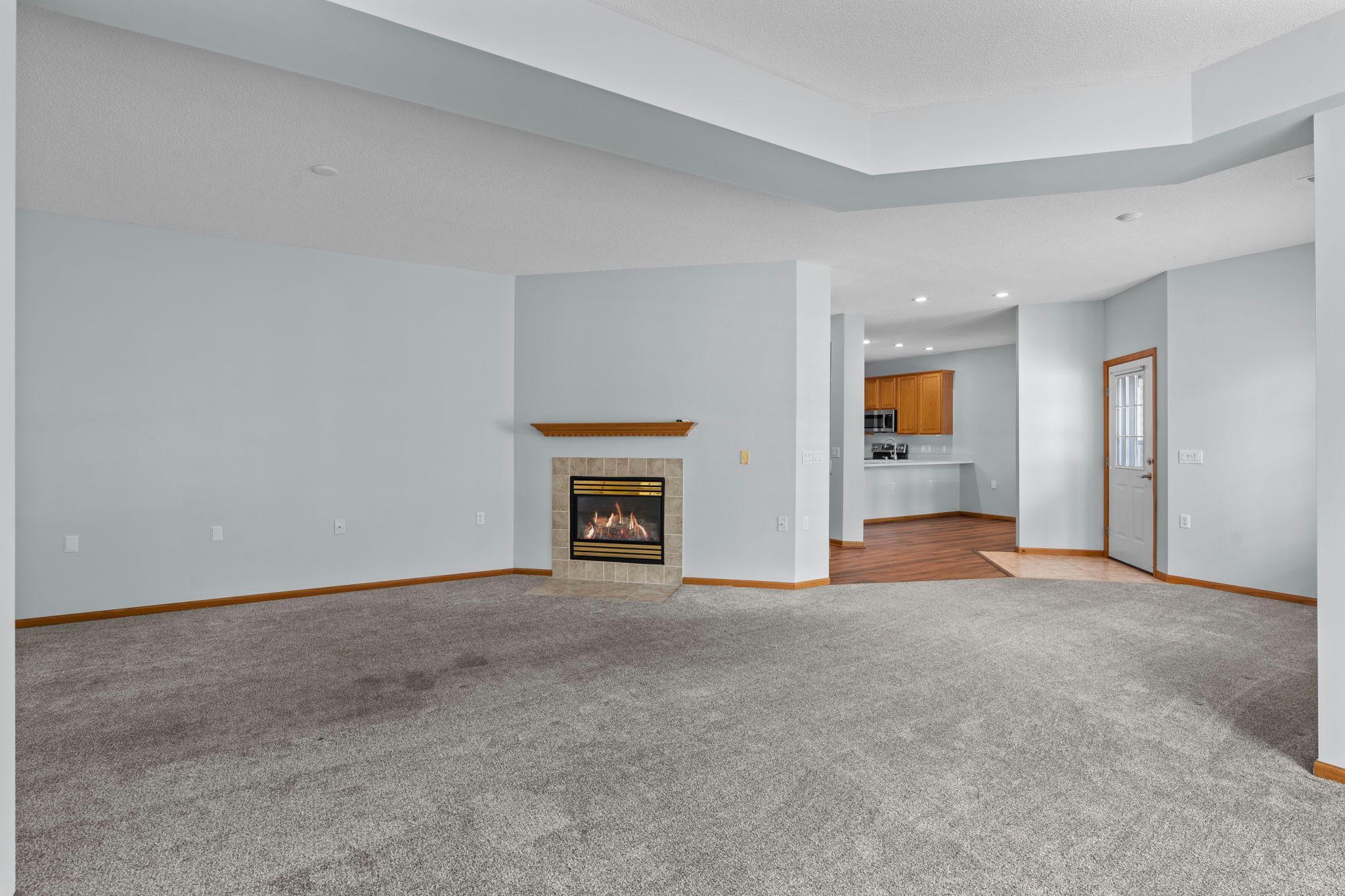 Cozy gas fireplace is a highlight of this spacious, one-level living!
