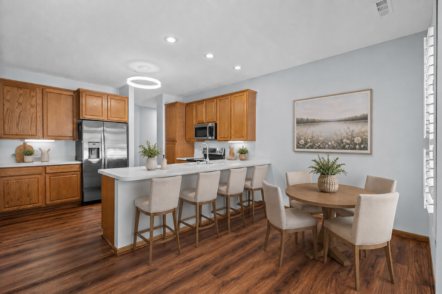 Beautiful kitchen with oversized breakfast that is perfect for entertaining. Fabulous dining nook for easy dining. (Virtual staging has been used to help highlight this home's features)