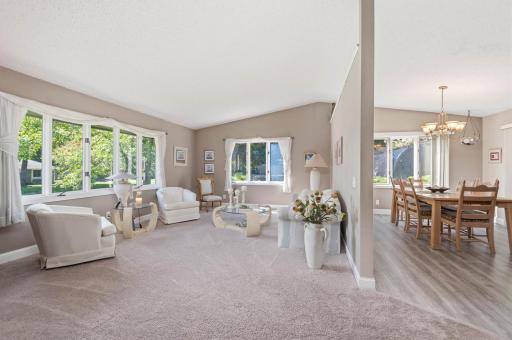Entertaining is a breeze on this level with the floor plan moving from the living room to the dining area, deck and kitchen.