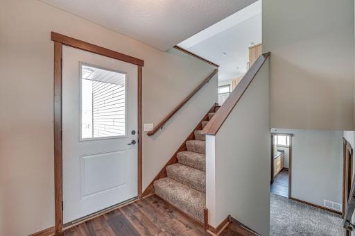 Finished lower level shown is from a previous model home. Lower-level finishing is available as an upgrade for an additional cost. Choose from a variety of colors, cabinets, trims, etc. All photos are from a similar model home.