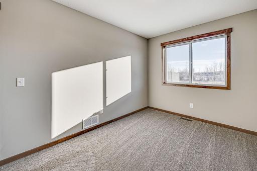 Finished lower level shown is from a previous model home. Lower-level finishing is available as an upgrade for an additional cost. Choose from a variety of colors, cabinets, trims, etc. All photos are from a similar model home.