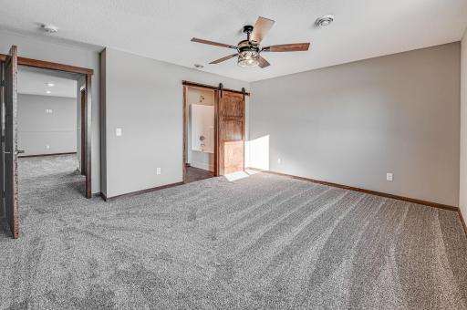 Finished lower level shown is from a previous model home. Lower-level finishing is available as an upgrade for an additional cost. Choose from a variety of colors, cabinets, trims, etc. All photos are from a similar model home.