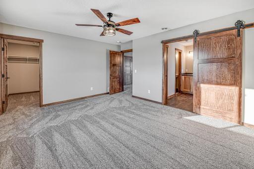 Finished lower level shown is from a previous model home. Lower-level finishing is available as an upgrade for an additional cost. Choose from a variety of colors, cabinets, trims, etc. All photos are from a similar model home.