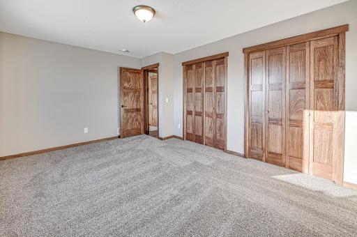 Finished lower level shown is from a previous model home. Lower-level finishing is available as an upgrade for an additional cost. Choose from a variety of colors, cabinets, trims, etc. All photos are from a similar model home.