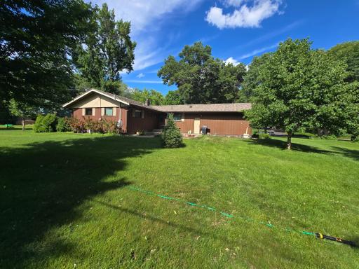 View of the West side of the home. Plenty of room for grilling on your patio