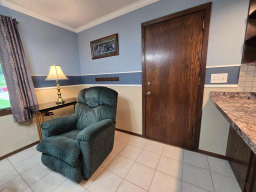 Current reading area and door to the double garage