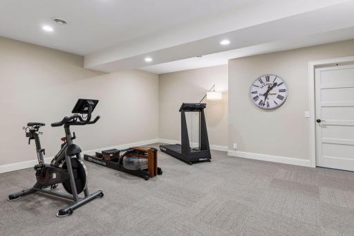 The versatile flex room is perfect for fitness, hobbies, gaming, or guest accommodations. Don't miss the huge walk-in storage closet and seasonal cedar closet.