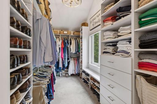 The oversized walk-in closet is thoughtfully designed to maximize space for convenience and ease.
