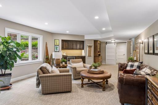 Comfortable and versatile, this space works well as a family room or private area for visiting family or guests.
