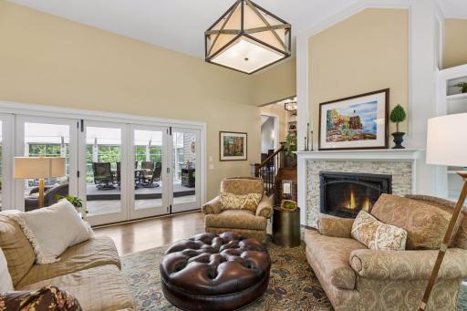 The light filled, three-season porch is accessible from the living room allowing light to flow in from both sides of the home.