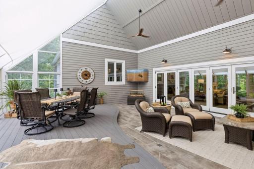 The three season porch is definitely a favorite feature of this home. Perfect for large gatherings, morning coffee or watching fall football games it is used throughout the year.