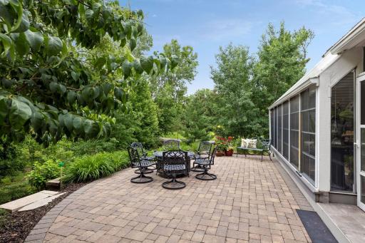 Another view of the private patio perched above HOA maintained yard and common area.