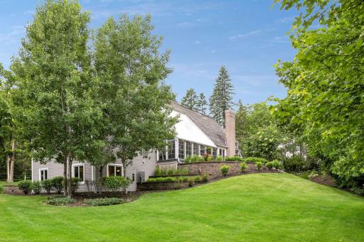 Enjoy beautiful landscaping and large lawn without the responsibility of mowing.