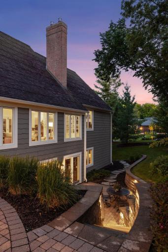 Beautifully landscaped with outdoor lighting.