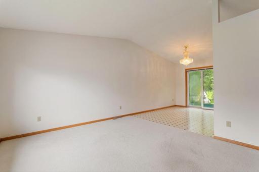 Unstaged view illustrating the flexible layout and spaciousness of the living and dining areas.