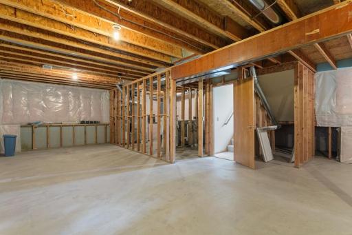 The unfinished walkout lower level offers excellent potential for expanded living space, with room to add a family room, additional bedroom, home office, hobby area, or a combination to suit your needs.