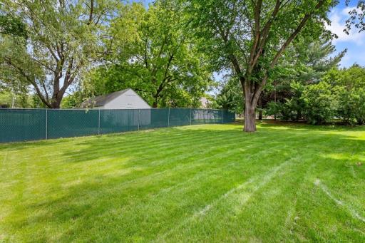Rarely do you find a yard like this! Nearly a quarter acre and fenced, offering endless outdoor possibilities.