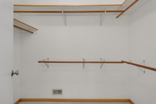 Walk-in closet provides abundant storage and organization space.