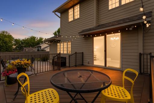 Enjoy morning coffee or evening sunsets from the maintenance-free deck overlooking the backyard.