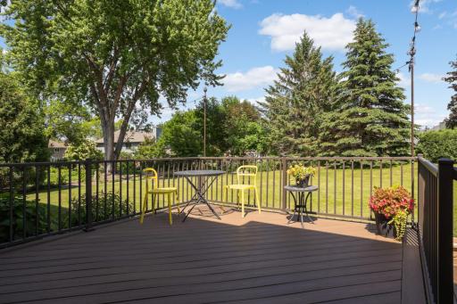 Enjoy morning coffee or evening sunsets from the maintenance-free deck overlooking the backyard.