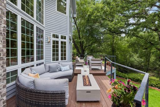 Expansive deck with new maintenance free railings. A great place to entertain and sit out and enjoy the gorgeous back yard.