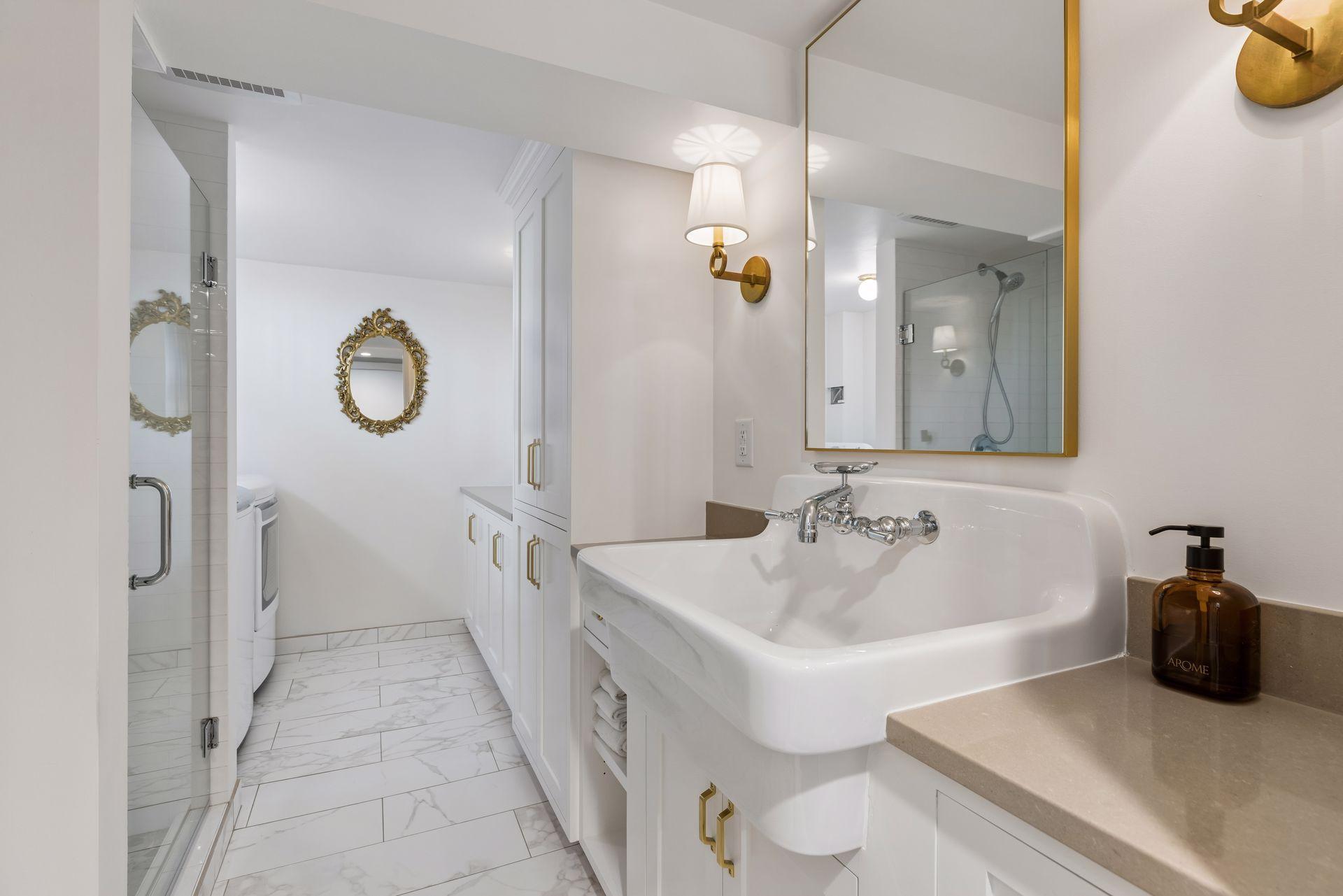 3/4 LL bath/laundry room attached features heated flooring.