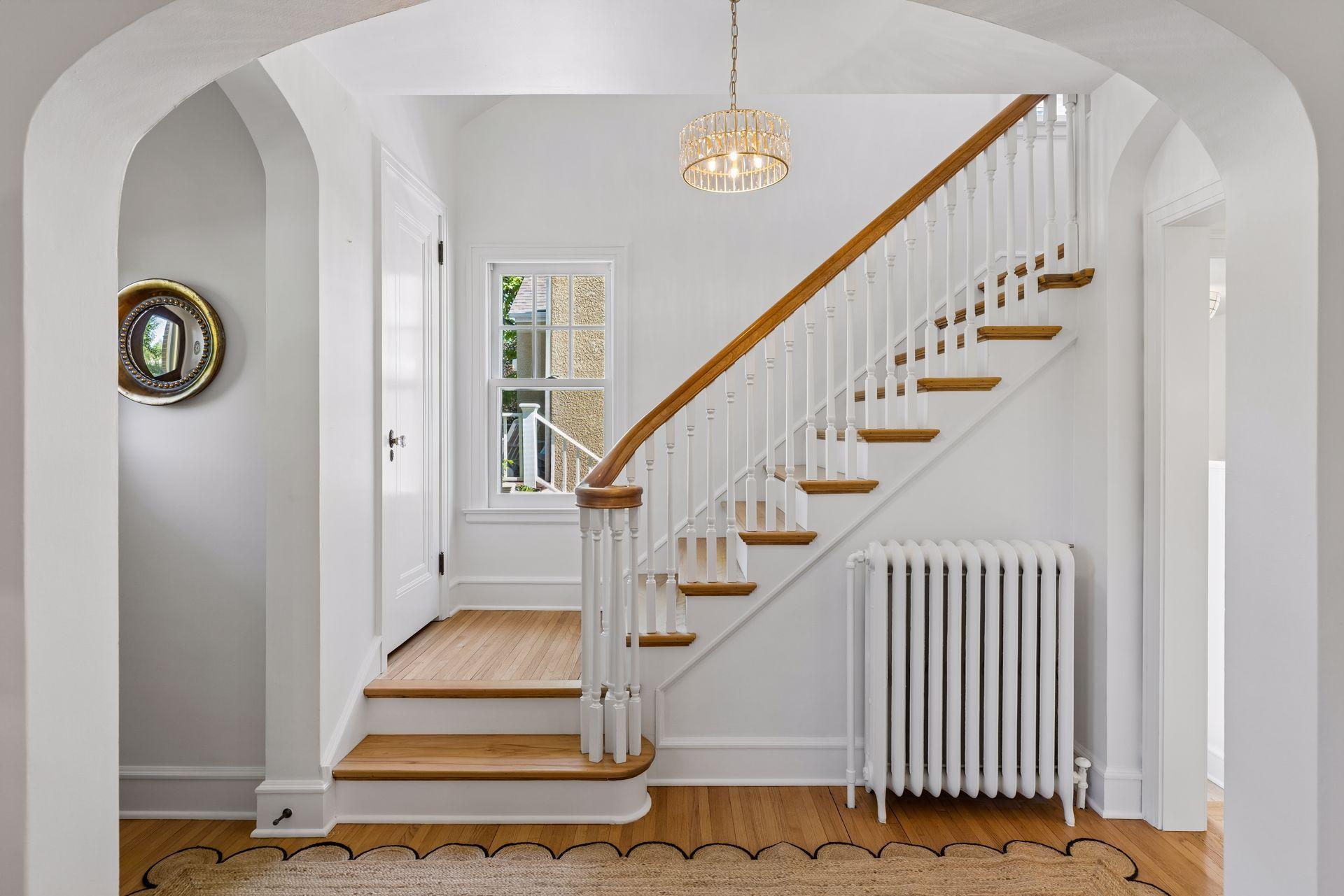 Beautiful archways throughout lend to integrity of era carried into the new addition.