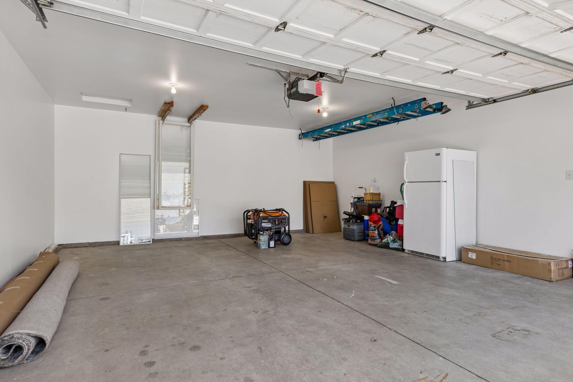 Garage space newly repainted, insulated. Two additional attic storage areas in garage accessible through ceiling in back of garage and front of garage.