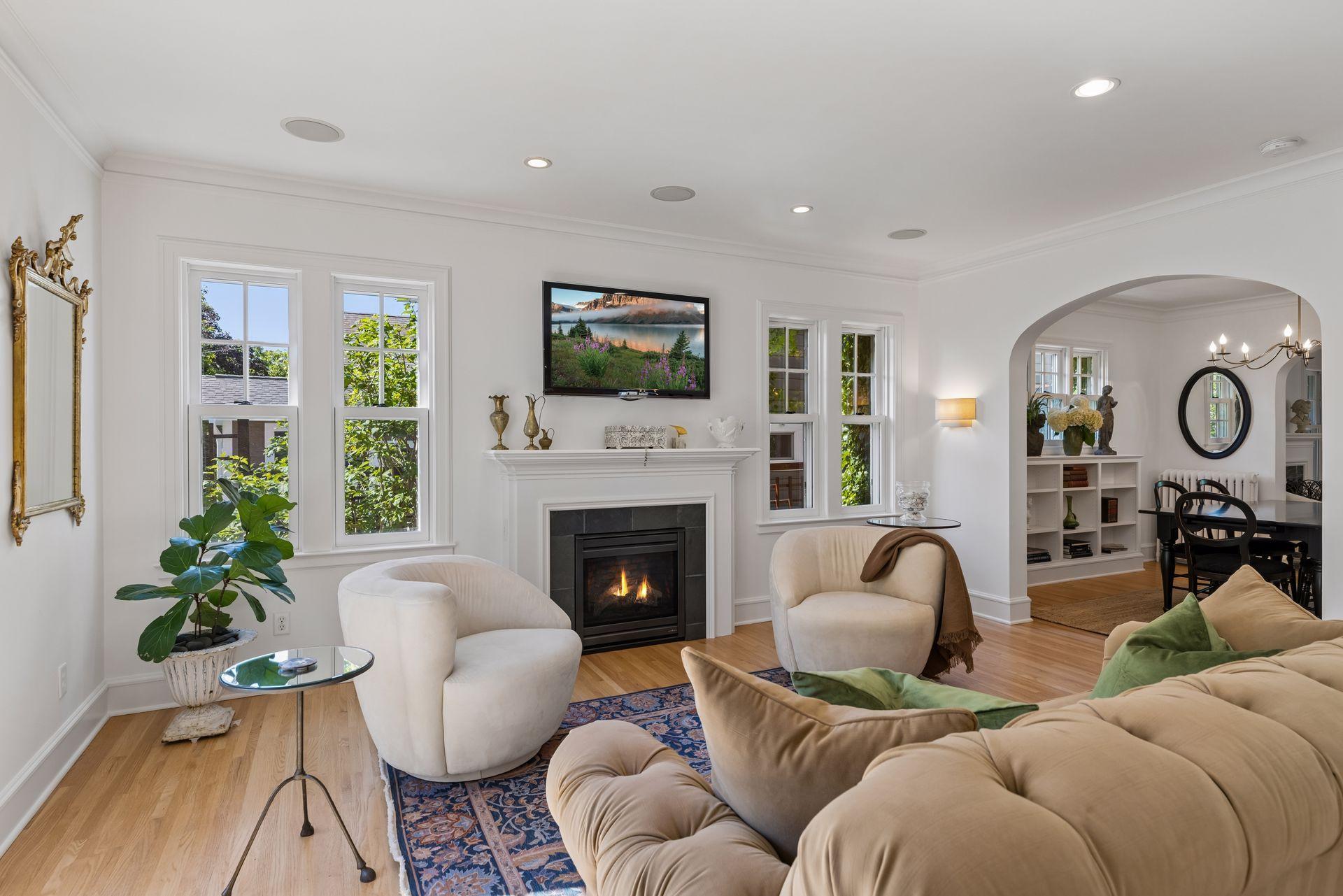 Family room features gas fireplace for cozy family gatherings.