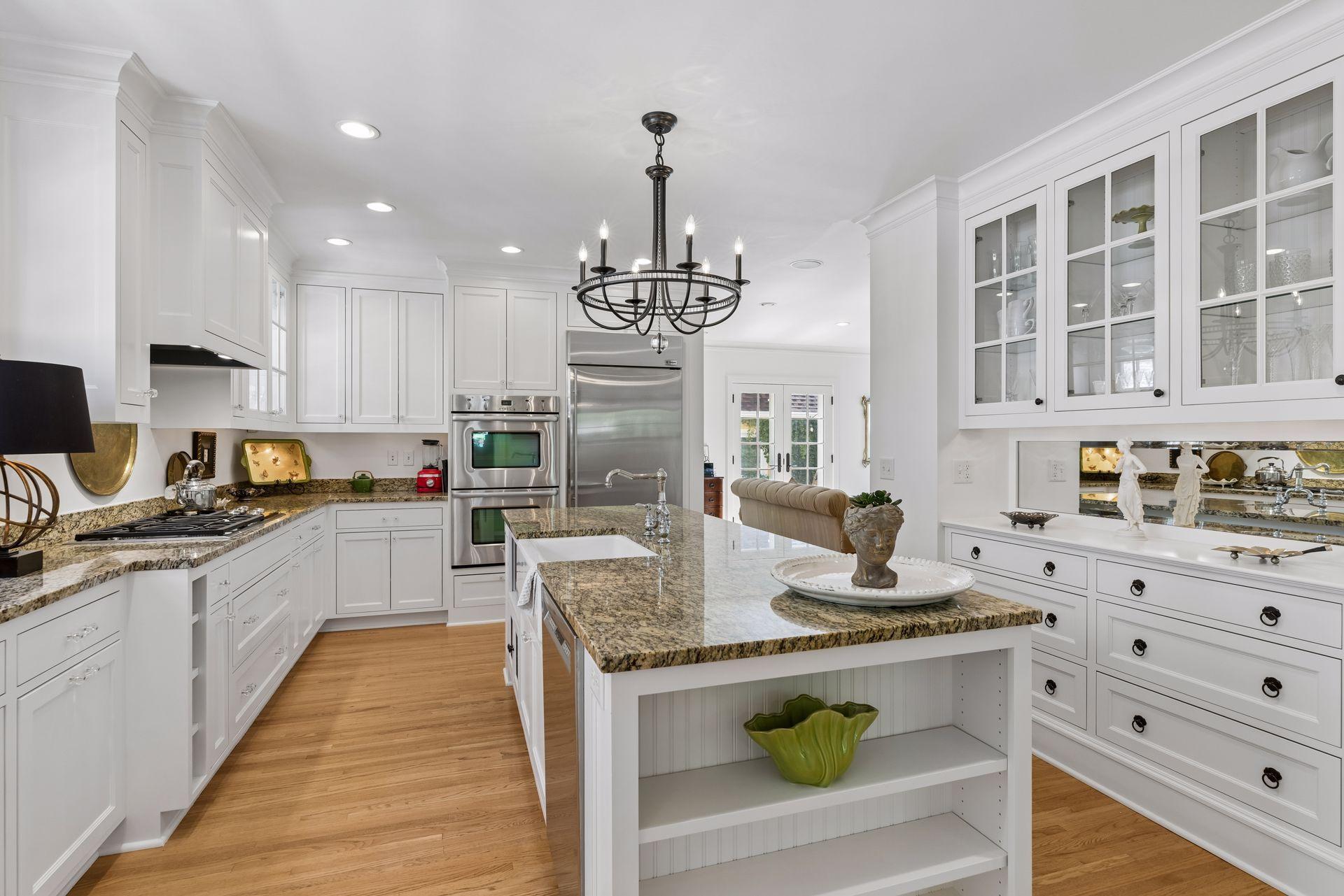 Custom cabinetry blends era of original home and provides great display opportunity.