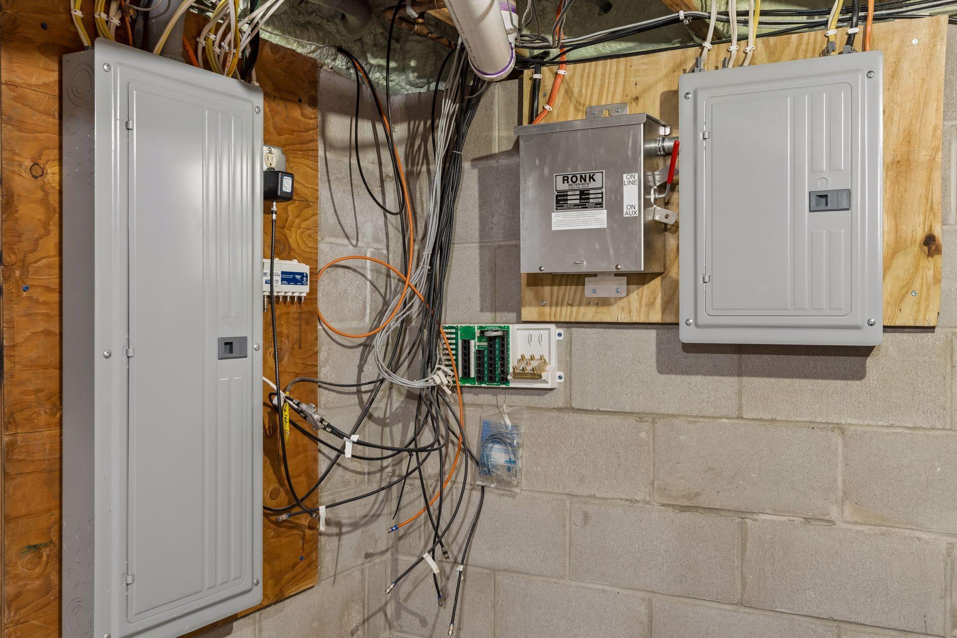 200 amp main service with addtional 100 amp service for generator in garage.