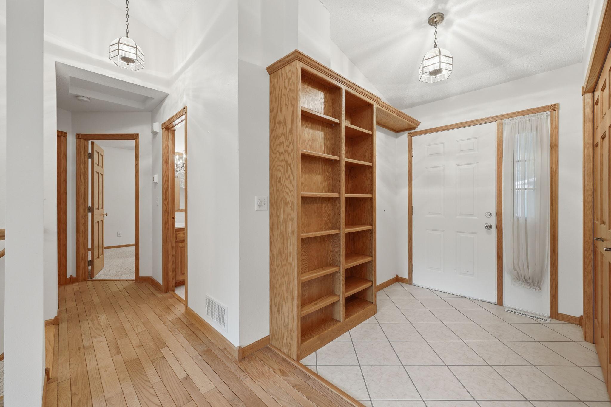Front entry & hall to bath & bedrooms