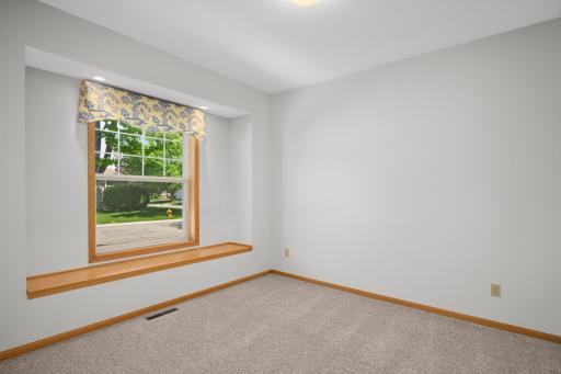 Many times, one-level living town homes don't feature a second bathroom and bedroom on the main floor. Guess what? This one does.