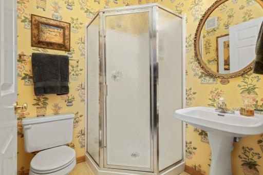 The main floor features a second bathroom, which happens to be a three-quarter, which makes it wonderful for guests.